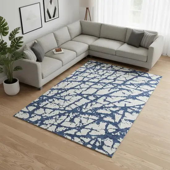 Navy Blue And Ivory Abstract Washable Area Rug With UV Protection Photo 2
