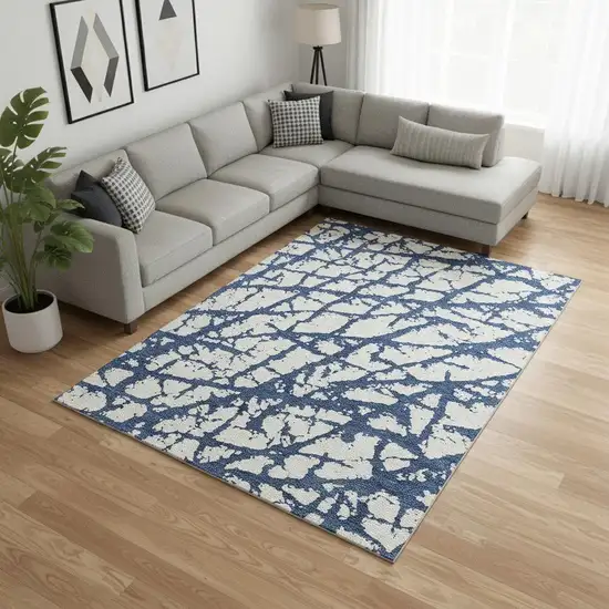 Navy Blue And Ivory Abstract Washable Area Rug With UV Protection Photo 2