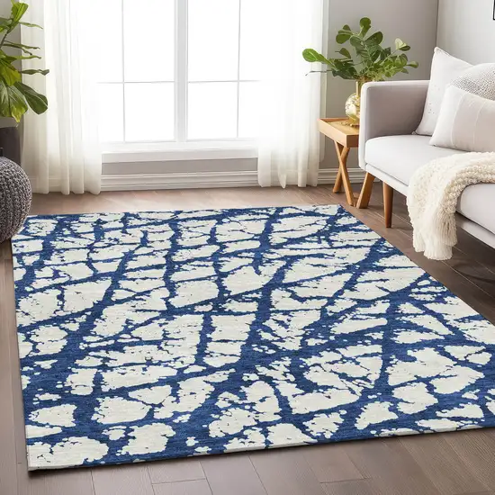 Navy Blue And Ivory Abstract Washable Area Rug With UV Protection Photo 4