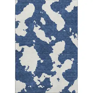 Photo of Navy Blue And Ivory Abstract Washable Area Rug With UV Protection