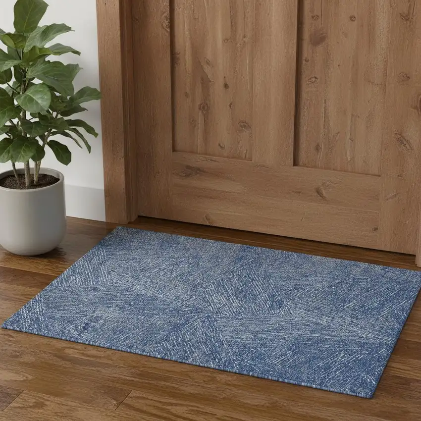 Navy Blue And Ivory Abstract Washable Area Rug With UV Protection Photo 1