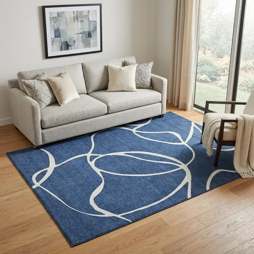 Navy Blue And Ivory Abstract Washable Area Rug With UV Protection Photo 1
