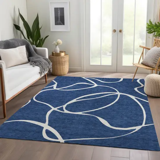 Navy Blue And Ivory Abstract Washable Area Rug With UV Protection Photo 4