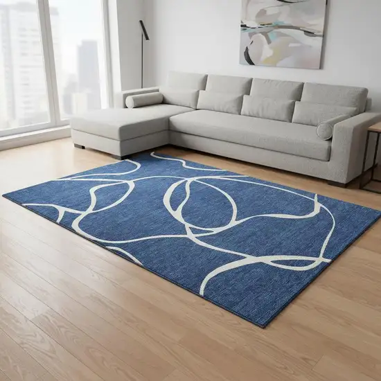 Navy Blue And Ivory Abstract Washable Area Rug With UV Protection Photo 2