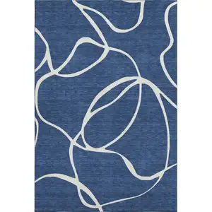 Photo of Navy Blue And Ivory Abstract Washable Area Rug With UV Protection
