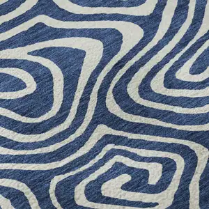 Photo of Navy Blue And Ivory Abstract Washable Area Rug With UV Protection