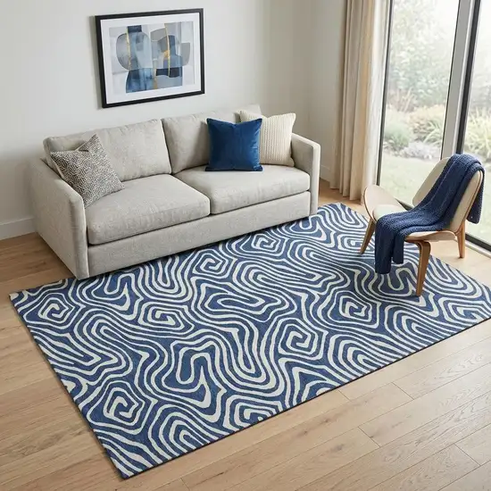 Navy Blue And Ivory Abstract Washable Area Rug With UV Protection Photo 1