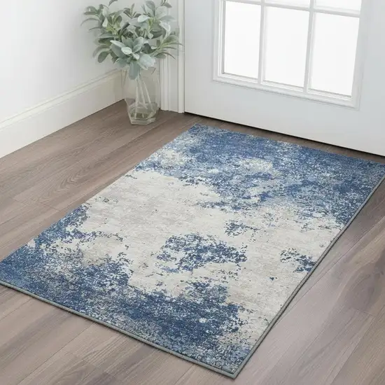 Navy Blue And Ivory Abstract Washable Area Rug With UV Protection Photo 2