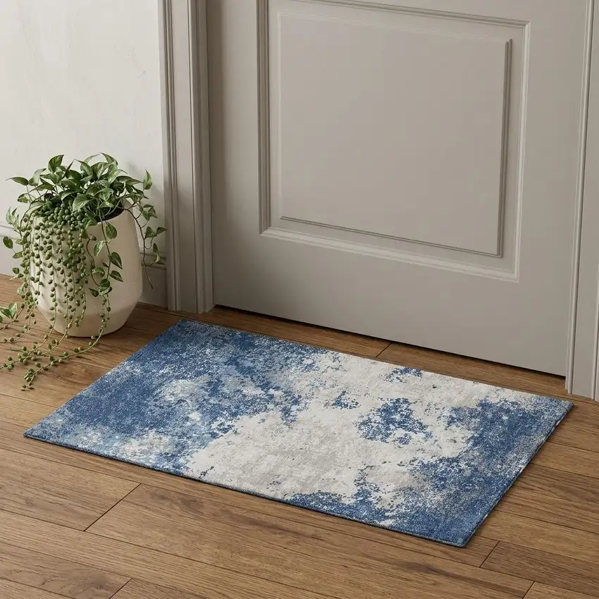 Navy Blue And Ivory Abstract Washable Area Rug With UV Protection Photo 1