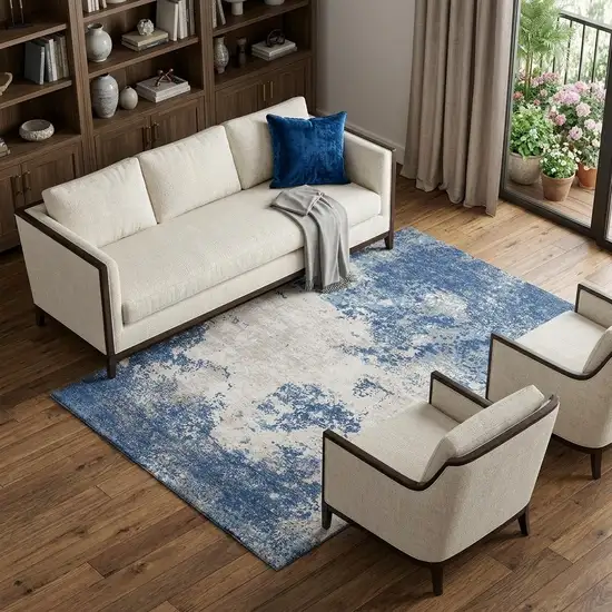 Navy Blue And Ivory Abstract Washable Area Rug With UV Protection Photo 1