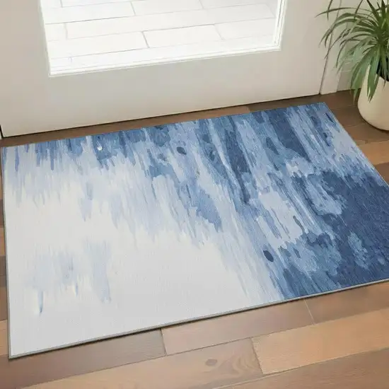 Navy Blue And Ivory Abstract Washable Area Rug With UV Protection Photo 2