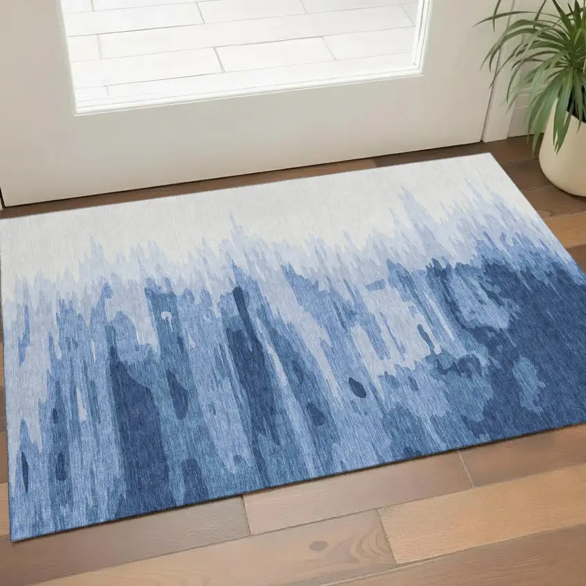 Navy Blue And Ivory Abstract Washable Area Rug With UV Protection Photo 1