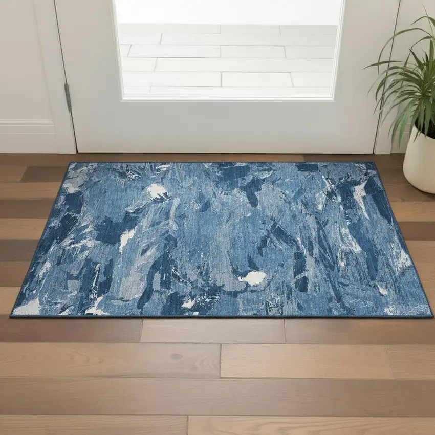Navy Blue And Ivory Abstract Washable Area Rug With UV Protection Photo 1