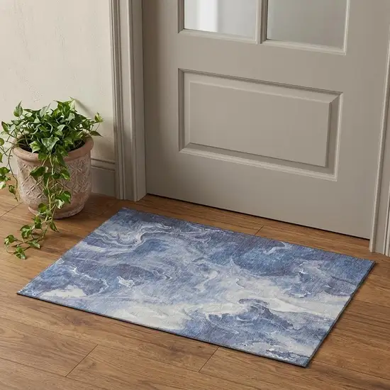 Navy Blue And Ivory Abstract Washable Area Rug With UV Protection Photo 1