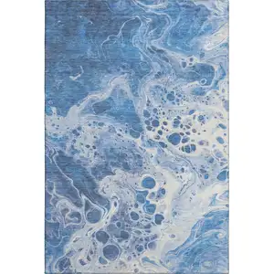 Photo of Navy Blue And Ivory Abstract Washable Area Rug With UV Protection