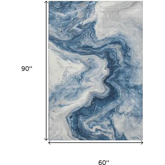 Navy Blue And Ivory Abstract Washable Area Rug With UV Protection Photo 9