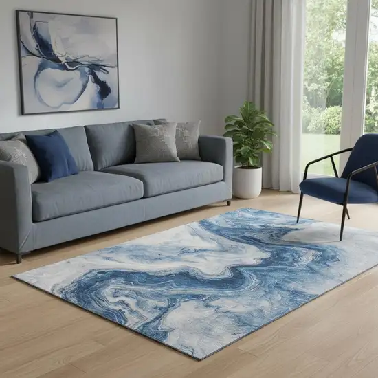 Navy Blue And Ivory Abstract Washable Area Rug With UV Protection Photo 2