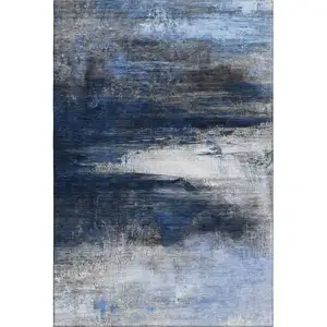 Photo of Navy Blue And Ivory Abstract Washable Area Rug With UV Protection