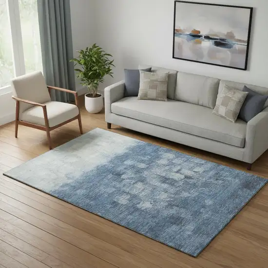 Navy Blue And Ivory Abstract Washable Area Rug With UV Protection Photo 1