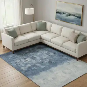 Photo of Navy Blue And Ivory Abstract Washable Area Rug With UV Protection