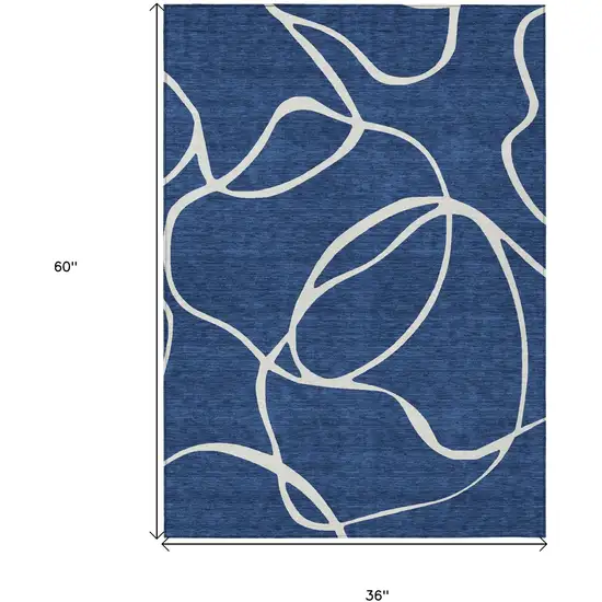 Navy Blue And Ivory Abstract Washable Indoor Outdoor Area Rug Photo 3
