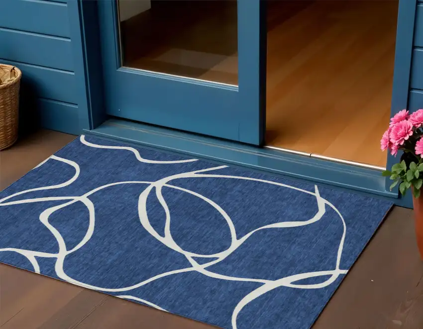 Navy Blue And Ivory Abstract Washable Indoor Outdoor Area Rug Photo 1