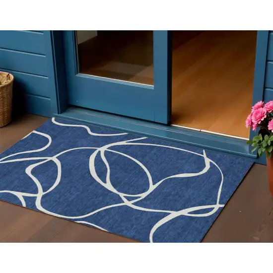 Navy Blue And Ivory Abstract Washable Indoor Outdoor Area Rug Photo 1