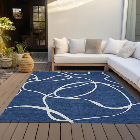 Navy Blue And Ivory Abstract Washable Indoor Outdoor Area Rug Photo 8