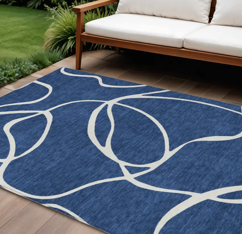 Navy Blue And Ivory Abstract Washable Indoor Outdoor Area Rug Photo 1