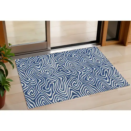 Navy Blue And Ivory Abstract Washable Indoor Outdoor Area Rug Photo 1