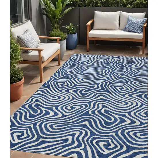 Navy Blue And Ivory Abstract Washable Indoor Outdoor Area Rug Photo 1