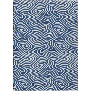 Photo of Navy Blue And Ivory Abstract Washable Indoor Outdoor Area Rug
