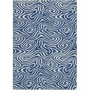 Photo of Navy Blue And Ivory Abstract Washable Indoor Outdoor Area Rug