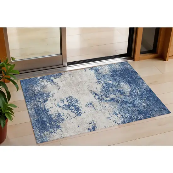 Navy Blue And Ivory Abstract Washable Indoor Outdoor Area Rug Photo 1