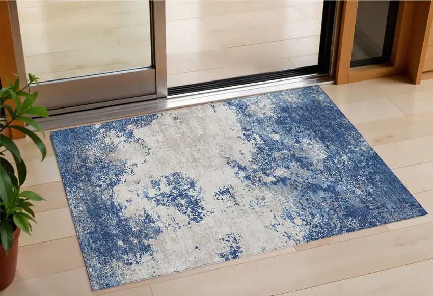 Navy Blue And Ivory Abstract Washable Indoor Outdoor Area Rug Photo 1
