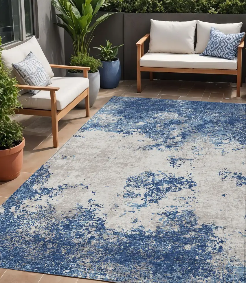 Navy Blue And Ivory Abstract Washable Indoor Outdoor Area Rug Photo 1