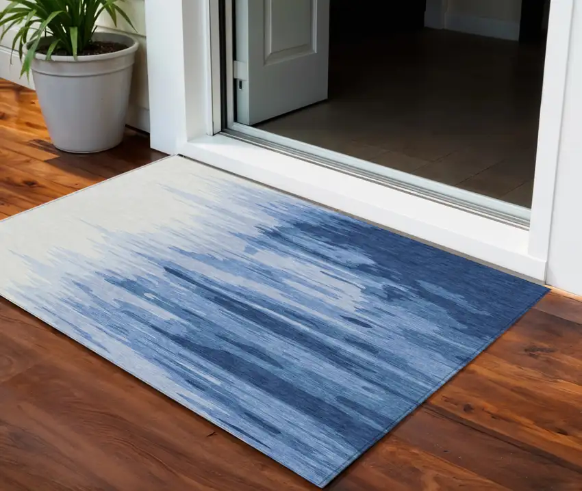 Navy Blue And Ivory Abstract Washable Indoor Outdoor Area Rug Photo 1