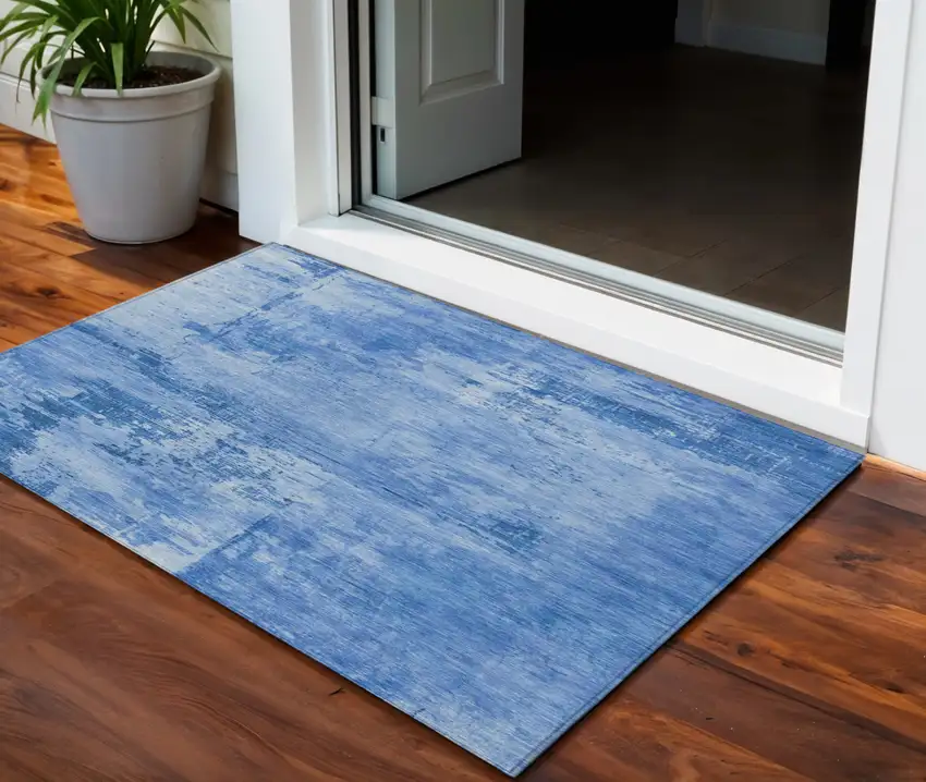 Navy Blue And Ivory Abstract Washable Indoor Outdoor Area Rug Photo 1