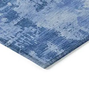 Photo of Navy Blue And Ivory Abstract Washable Indoor Outdoor Area Rug