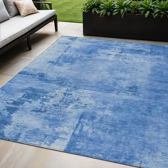Navy Blue And Ivory Abstract Washable Indoor Outdoor Area Rug Photo 1