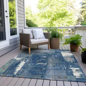 Photo of Navy Blue And Ivory Abstract Washable Indoor Outdoor Area Rug