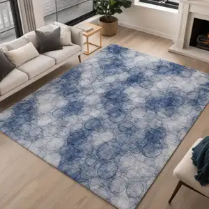 Photo of Navy Blue And Ivory Abstract Washable Indoor Outdoor Area Rug