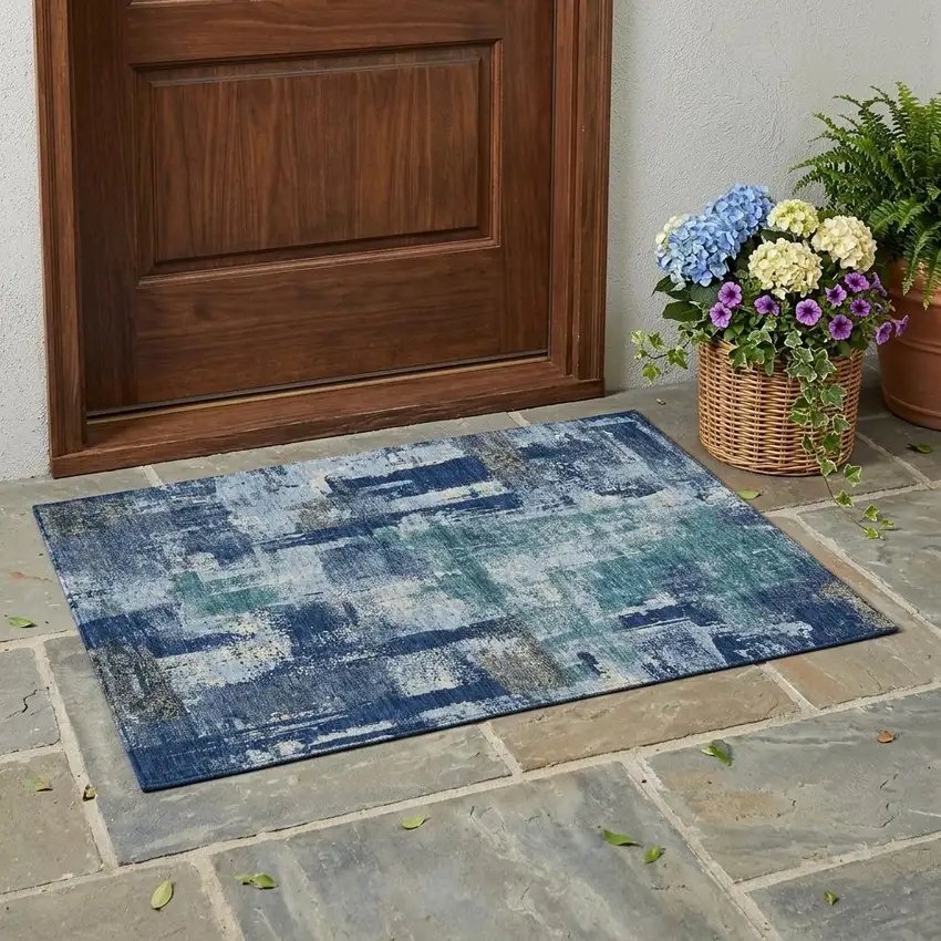 Navy Blue And Ivory Abstract Washable Indoor Outdoor Area Rug Photo 1