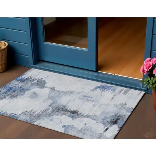 Navy Blue And Ivory Abstract Washable Indoor Outdoor Area Rug Photo 1