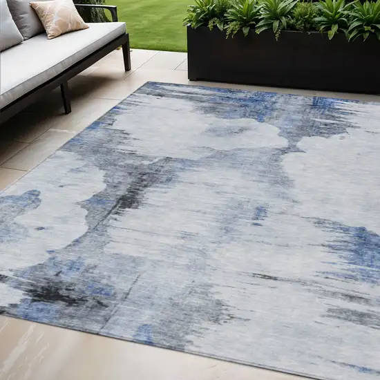 Navy Blue And Ivory Abstract Washable Indoor Outdoor Area Rug Photo 1