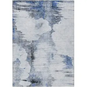 Photo of Navy Blue And Ivory Abstract Washable Indoor Outdoor Area Rug