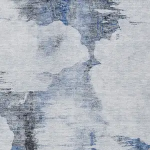 Photo of Navy Blue And Ivory Abstract Washable Indoor Outdoor Area Rug