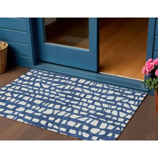 Navy Blue And Ivory Abstract Washable Indoor Outdoor Area Rug Photo 1