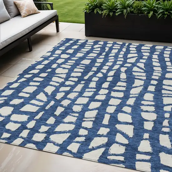 Navy Blue And Ivory Abstract Washable Indoor Outdoor Area Rug Photo 1