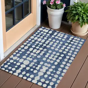 Photo of Navy Blue And Ivory Abstract Washable Indoor Outdoor Area Rug
